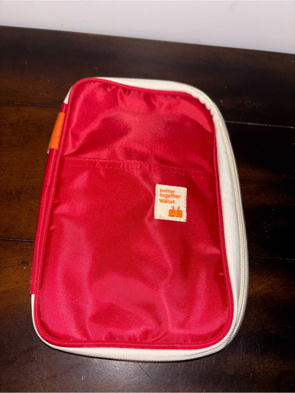 This is a red MochiThings Better Together Pouch v2